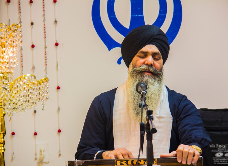 Sikh man on the harmonium