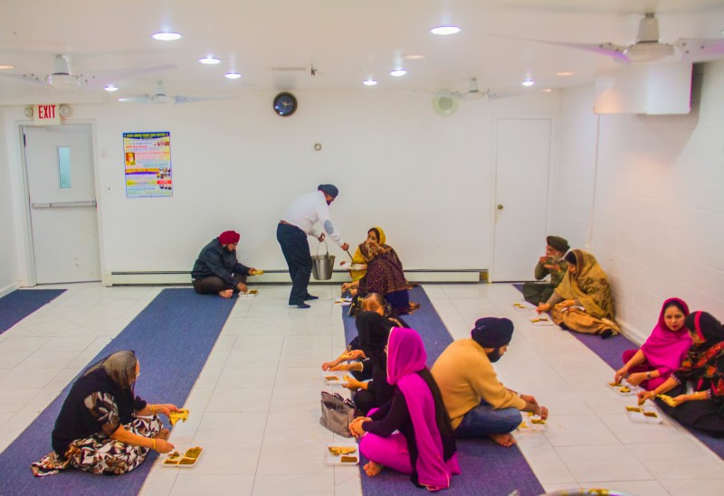 Langar-Serving and sharing food